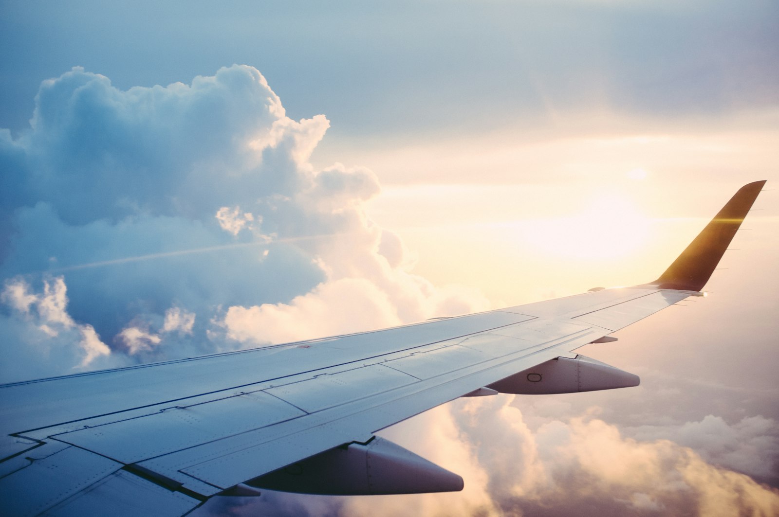 Aircraft wing above the clouds